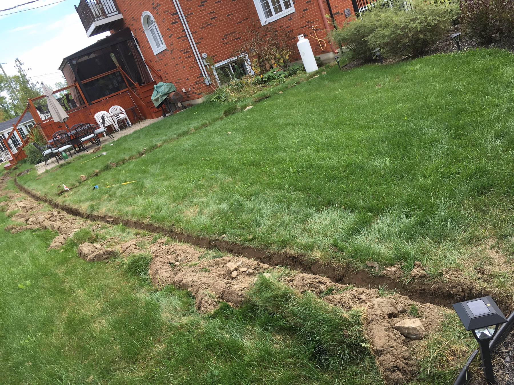 Île-Bizard Install — Backyard under way